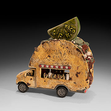 a ceramic truck, the trailer of which is shaped like a taco